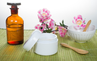 Fototapeta na wymiar Natural facial skincare handmade with fresh natural ingredients, oil and beeswax.