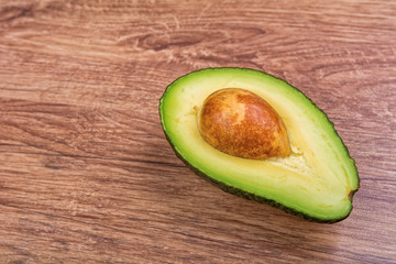 Avocado on a wooden background