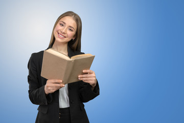 Smiling girl with books