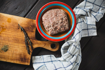 minced meat on wooden table