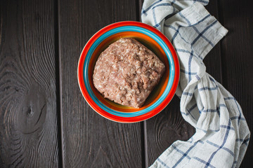 minced meat on wooden table