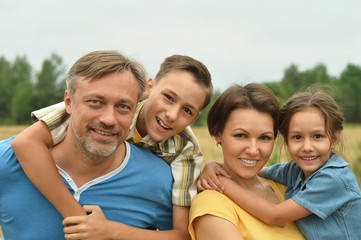 happy family at   field