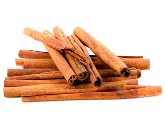 Cinnamon sticks on white background