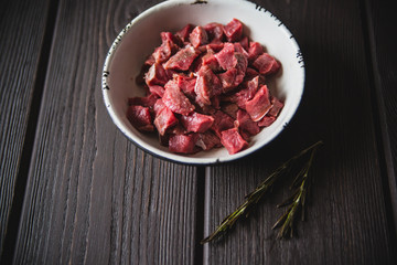 minced meat on wooden table