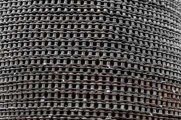 Background of metal link chain on Roller Curve, Art and recycle design from chain