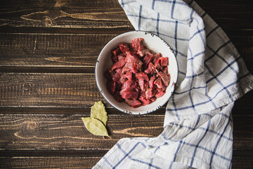 minced meat on wooden table