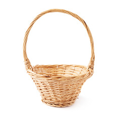 Brown wicker basket isolated over the white background