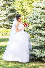 Fototapeta na wymiar Beautiful wedding bouquet in hands of the bride