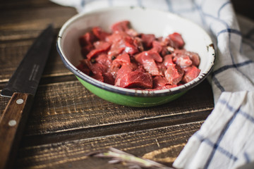 minced meat on wooden table