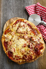 Pizza with sausages
