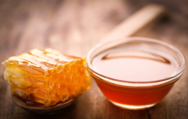 Honeycomb in a wooden spoon