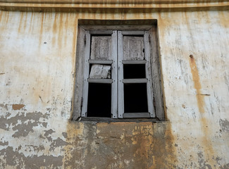 Fototapeta na wymiar Old wall building with windows