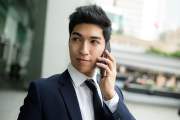 Business man chat on mobile phone