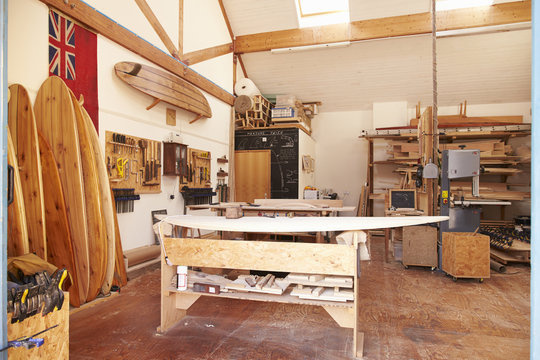 Handmade Boards In Empty Bespoke Surfboard Workshop - Powered by Adobe