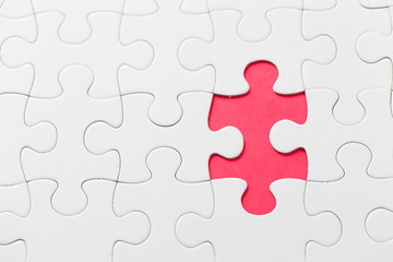 Jigsaw puzzle on red background