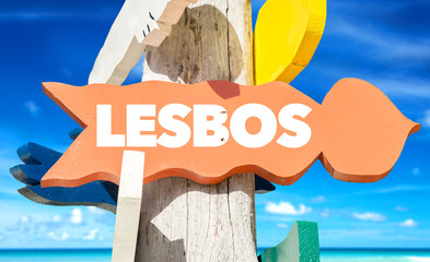 Lesbos signpost with beach background