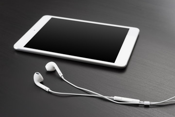 Digital tablet and headphones