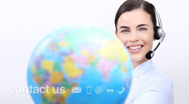contact us, customer service operator woman with headset smiling, holding globe