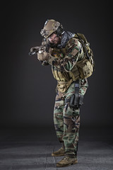 US Army Soldier on Dark Background - 108377269