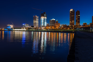 City of Milwaukee Wisconsin at Night lakefront lights reflection in lake Michigan