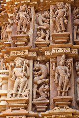 Bas-relief at famous ancient temple in Khajuraho, India