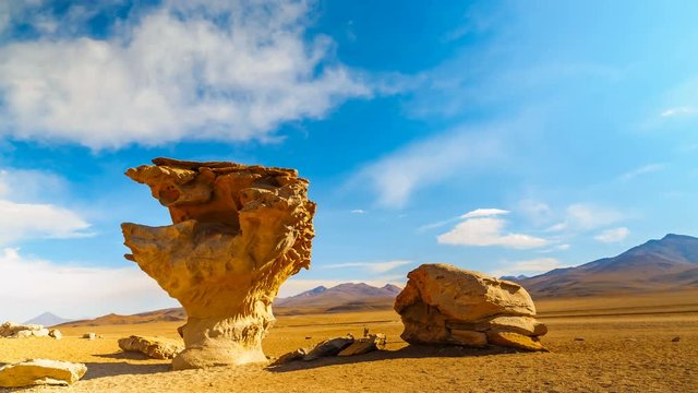 Clouds moving at Arbol de Piedra the volcanic rock formation in Uyuni, Bolivia, Time lapse