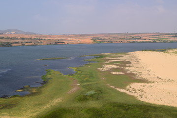 lake in white sand dunes - Bau Trang, Mui Ne, Vietnam