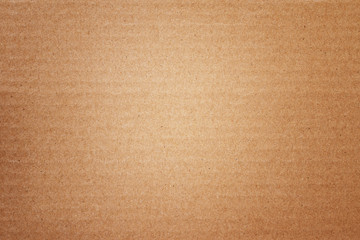Fototapeta na wymiar texture of corrugated cardboard with vignette.