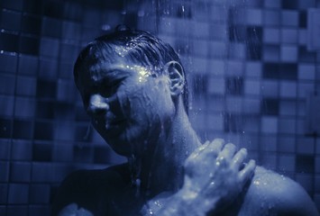 man take a shower