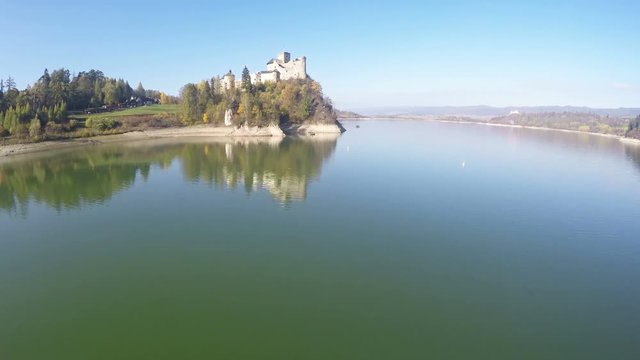 Aerial footage of Niedzica Castle at Czorsztyn Lake in Poland 
