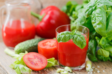 Tomato juice. Vegetable juice made of tomatoes, bell peppers, celery, Basil and spices