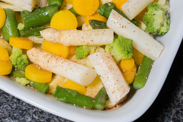 tasty casserole of green and white asparagus