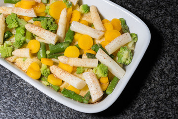 tasty casserole of green and white asparagus