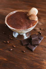 Italian dessert Tiramisu in a sundae dish
