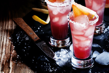 Alcoholic cocktail with grapefruit juice, vodka and salt, select