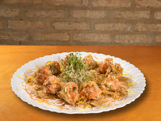 Salmon sashimi with Japanese mayonese served as an apetizer