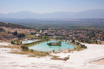 Pamukkale. Turkey. Mountain slope with travertine and valley with lake