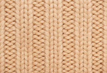 light brown and yellow knitted wool macro photo, texture background