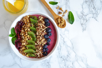 Berry smoothie with blueberries, kiwi fruit, sunflower seeds, gr