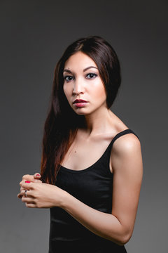 Middle East ethnic girl posing in fashion style in Studio
