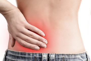 Young girl with back pain close up