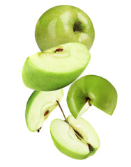 Falling ripe apples isolated on white