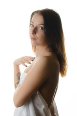 Obraz premium Beautiful young woman with fresh healthy skin. Beautiful young woman with cream on her shoulder 