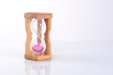 hourglass sand clock isolated on white screen