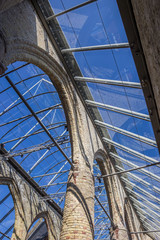 Ruins of the Broere church with modern glass roof in Bolsward