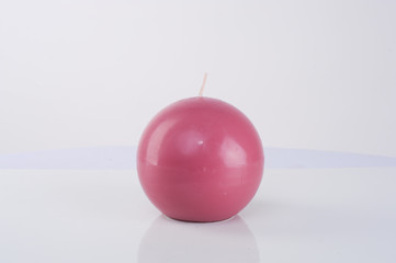 pink purple circle candle on white screen