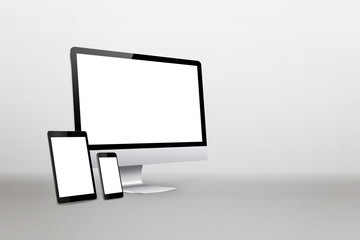 Devices with isolated white display for responsive web promotion. Computer, laptop, tablet, smart phone on desk. Isometric view