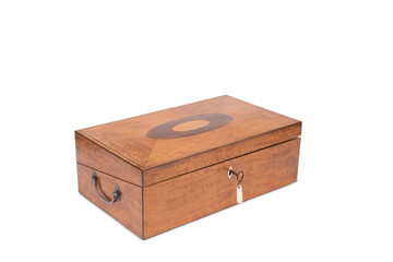 A Closed Vintage Wooden Vanity Box with Key in Lock