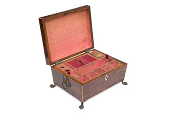 An Opened Vintage Legged Jewelry Box
