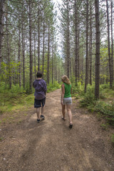 a family hiking on a sunny day trip